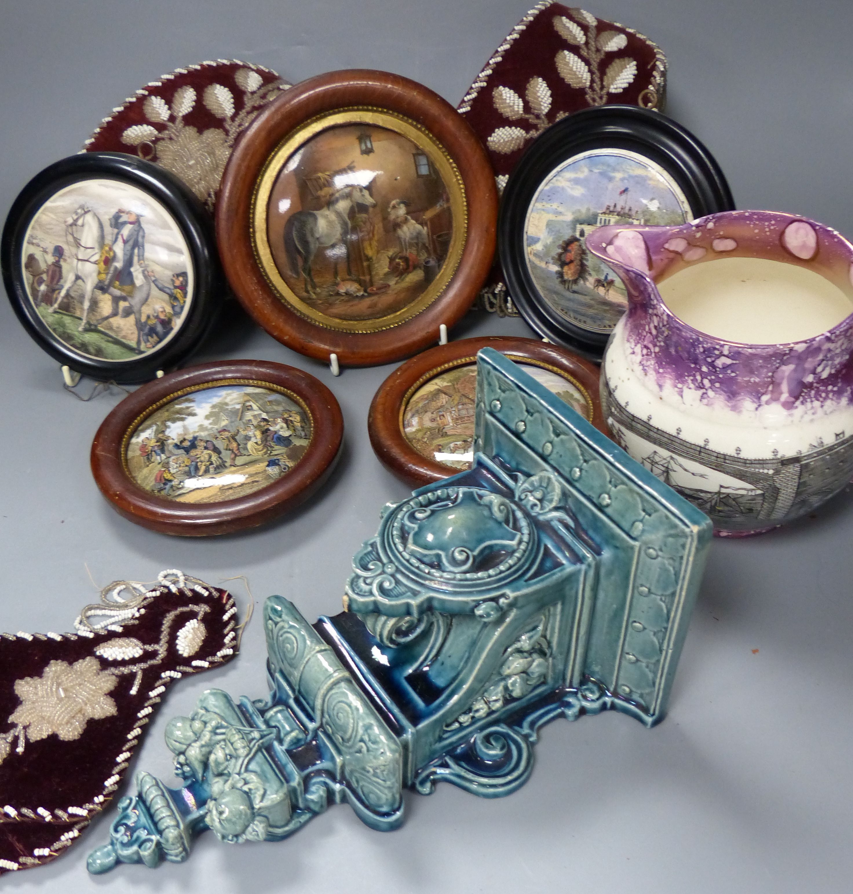 A quantity of mixed collectables including beadwork, wall shelves, a blue glazed wall bracket, a lustre jug, etc.